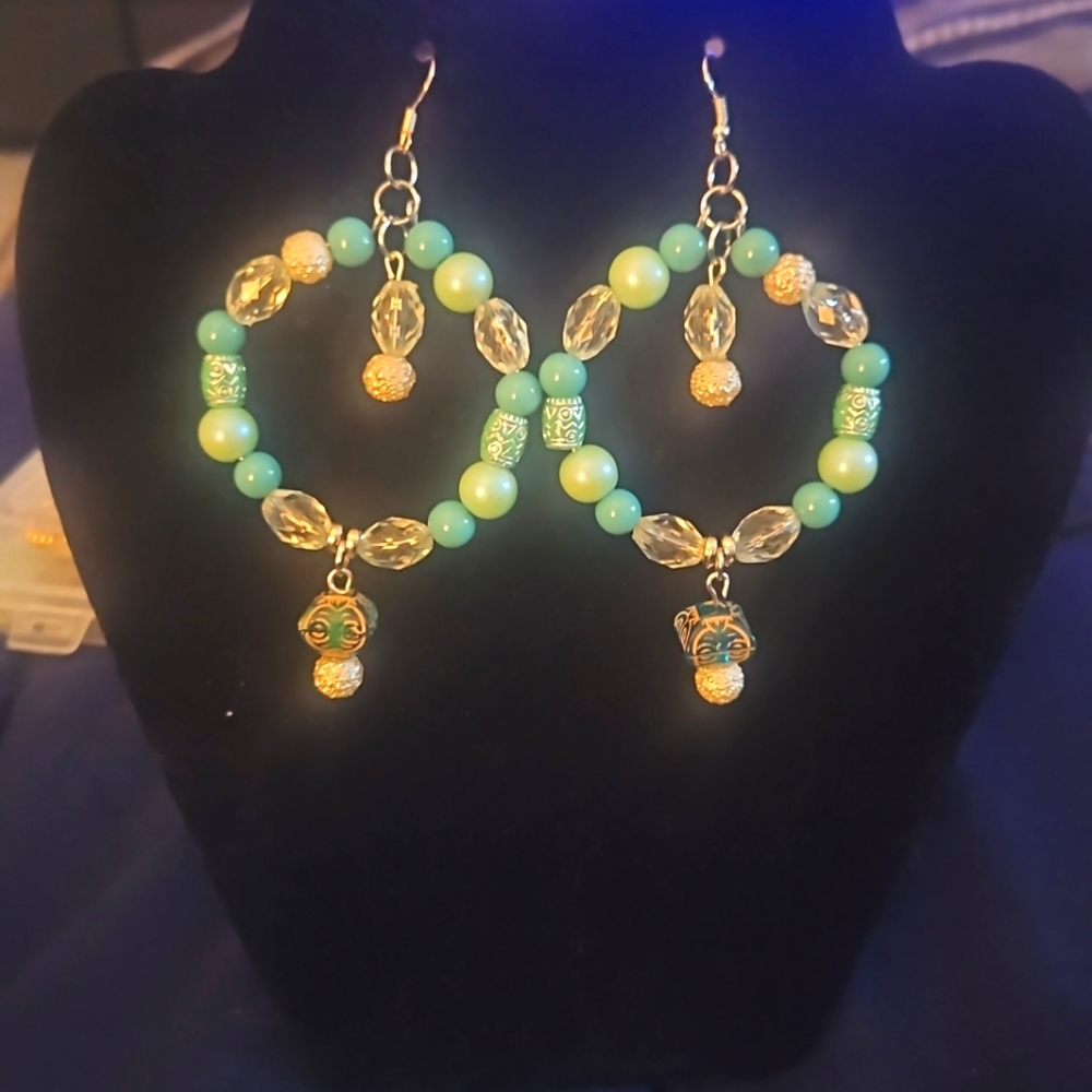 Beautiful  teal color stone beads hoops.